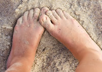 Sandy toes on a sandy beach